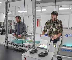 Two Associates working in a lab