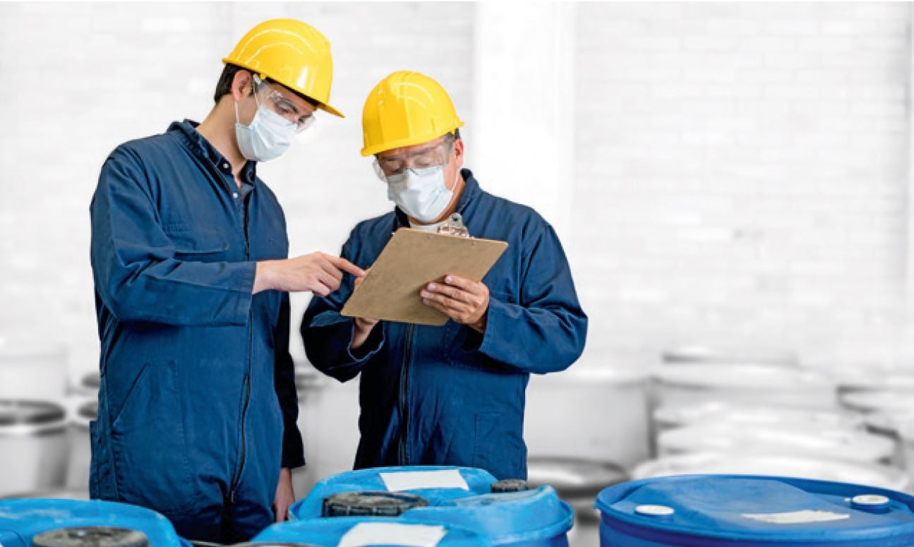 Men inspecting barrels